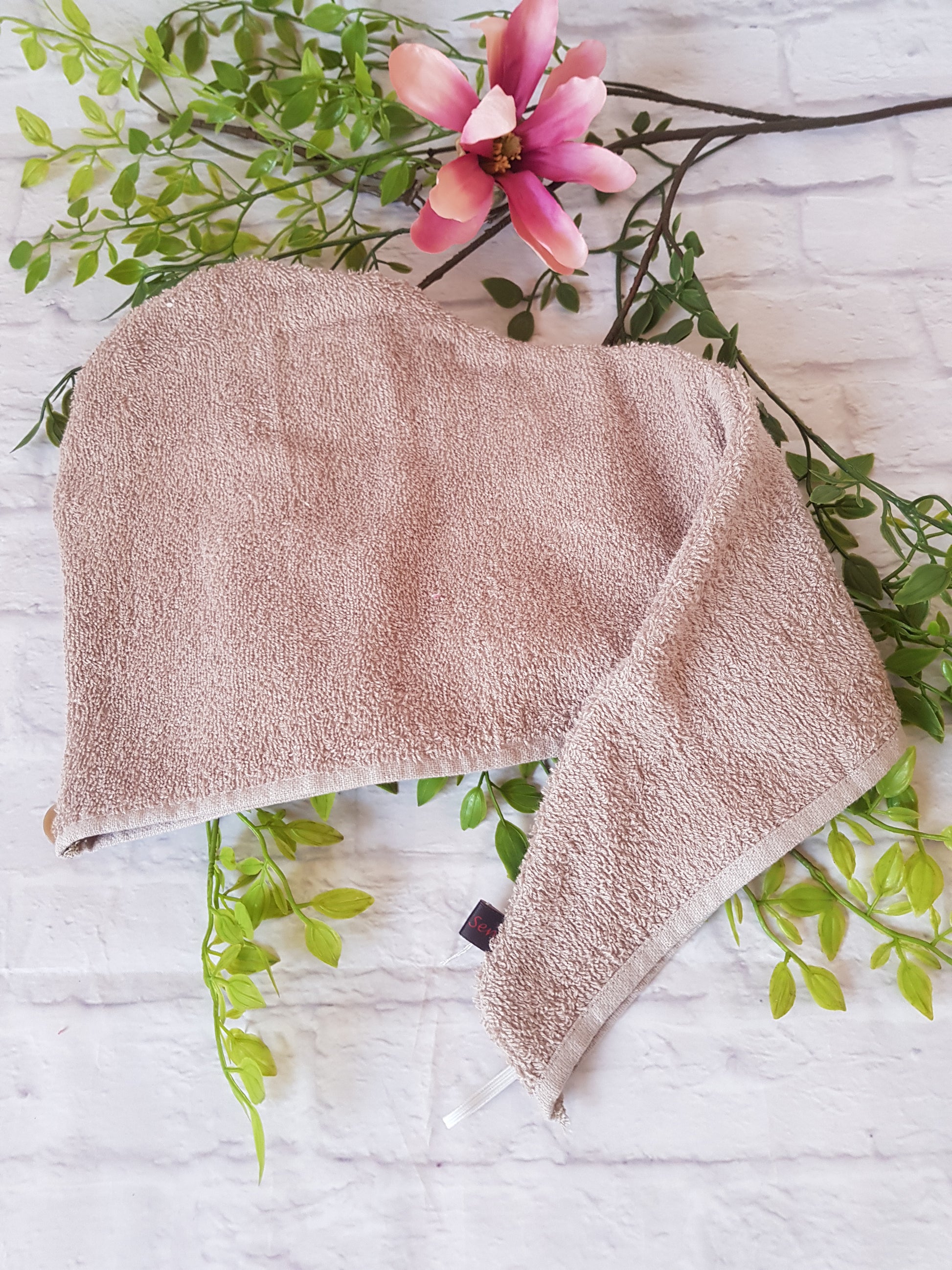 Turban Handtuch in caramel braun liegend